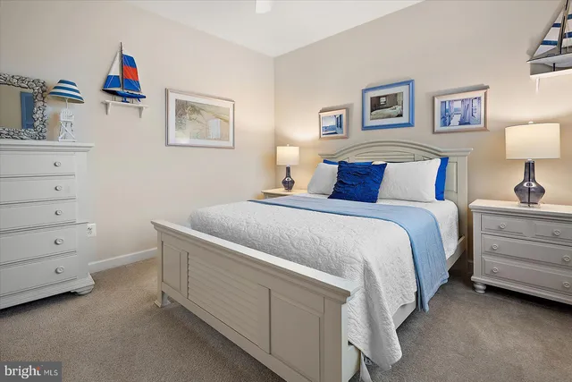 an aerial view of a house with a ocean view