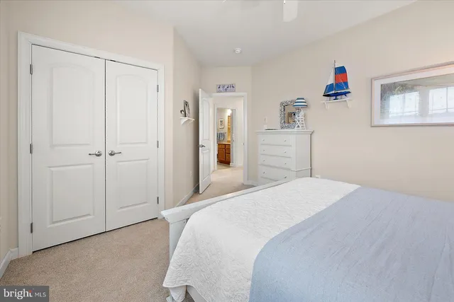 an aerial view of a house with a lake view