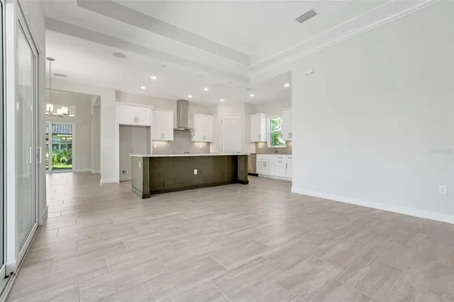 $900,000 | 132 New Leatherwood Drive, Palm Coast, FL 32137