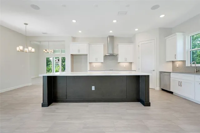 $900,000 | 132 New Leatherwood Drive, Palm Coast, FL 32137