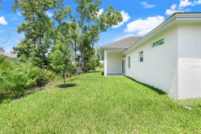 $900,000 | 132 New Leatherwood Drive, Palm Coast, FL 32137