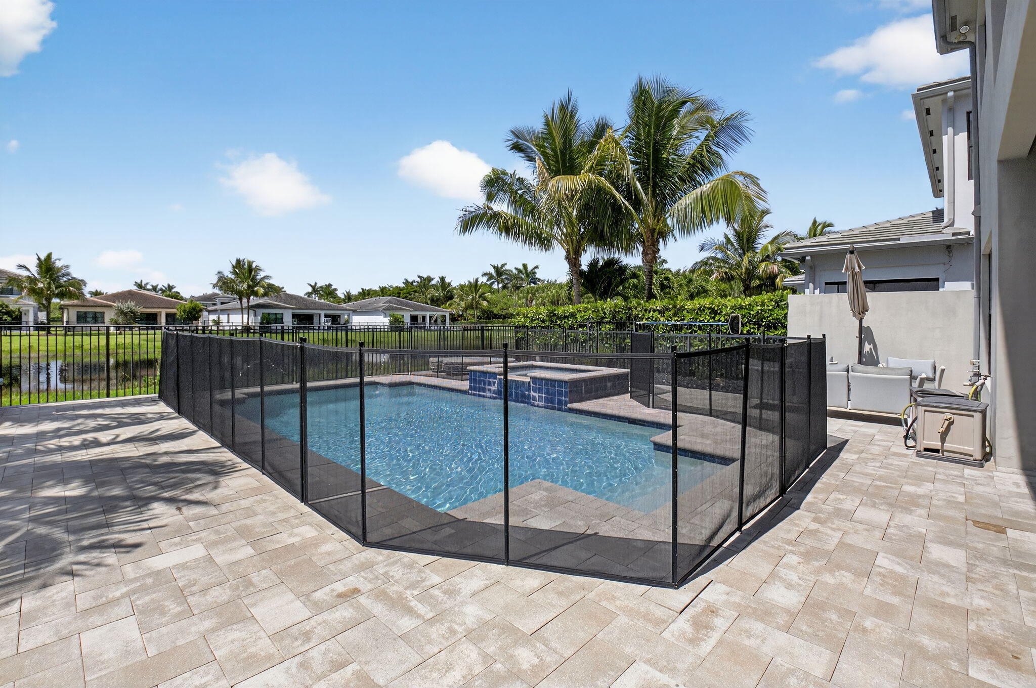 8858 Skyward Street Boca Raton, FL 33496 - Photo 64 of 116 Heated Pool with childproof gate