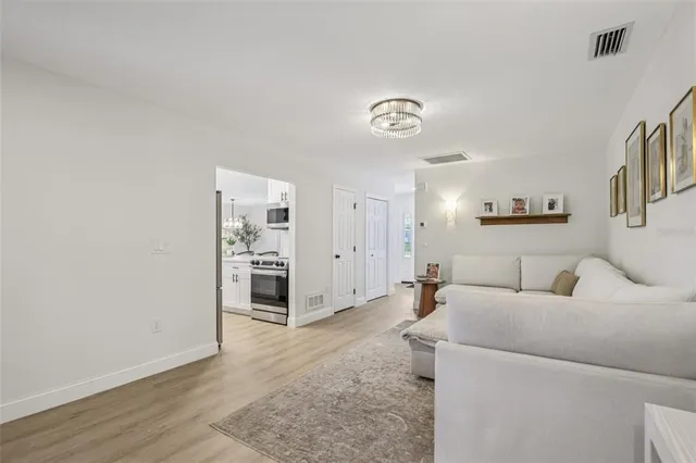 a living room with furniture and a table