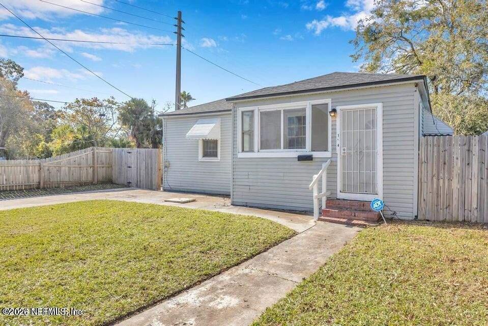 1804 Cleveland Street Jacksonville, FL 32209 - Photo 2 of 25 a view of a house with backyard and tree