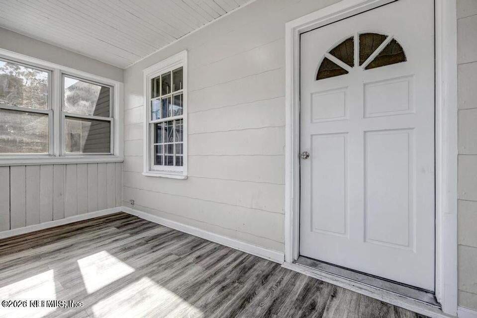 1804 Cleveland Street Jacksonville, FL 32209 - Photo 4 of 25 an empty room with windows