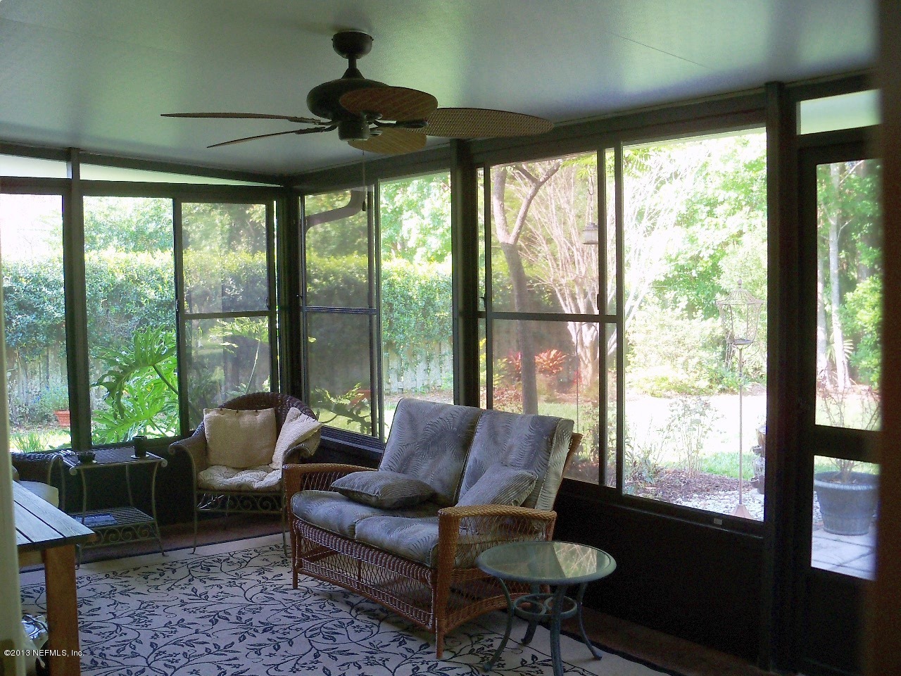 1528 Marsh Rabbit Way Fleming Island, FL 32003 - Photo 11 of 16 1528 Marsh Rabbit Screen Porch 1