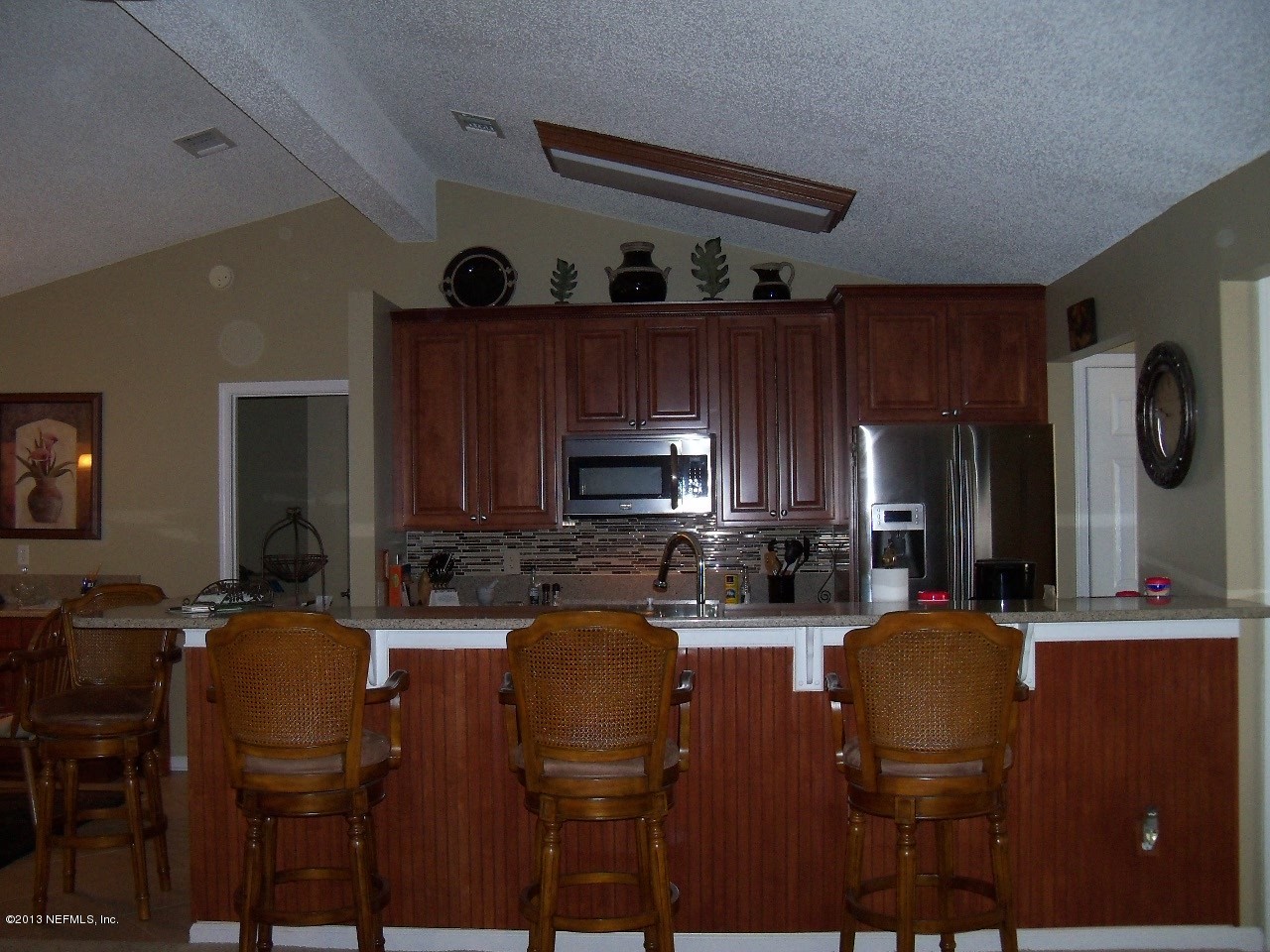 1528 Marsh Rabbit Way Fleming Island, FL 32003 - Photo 6 of 16 1528 Marsh Rabbit Family to Kitchen View