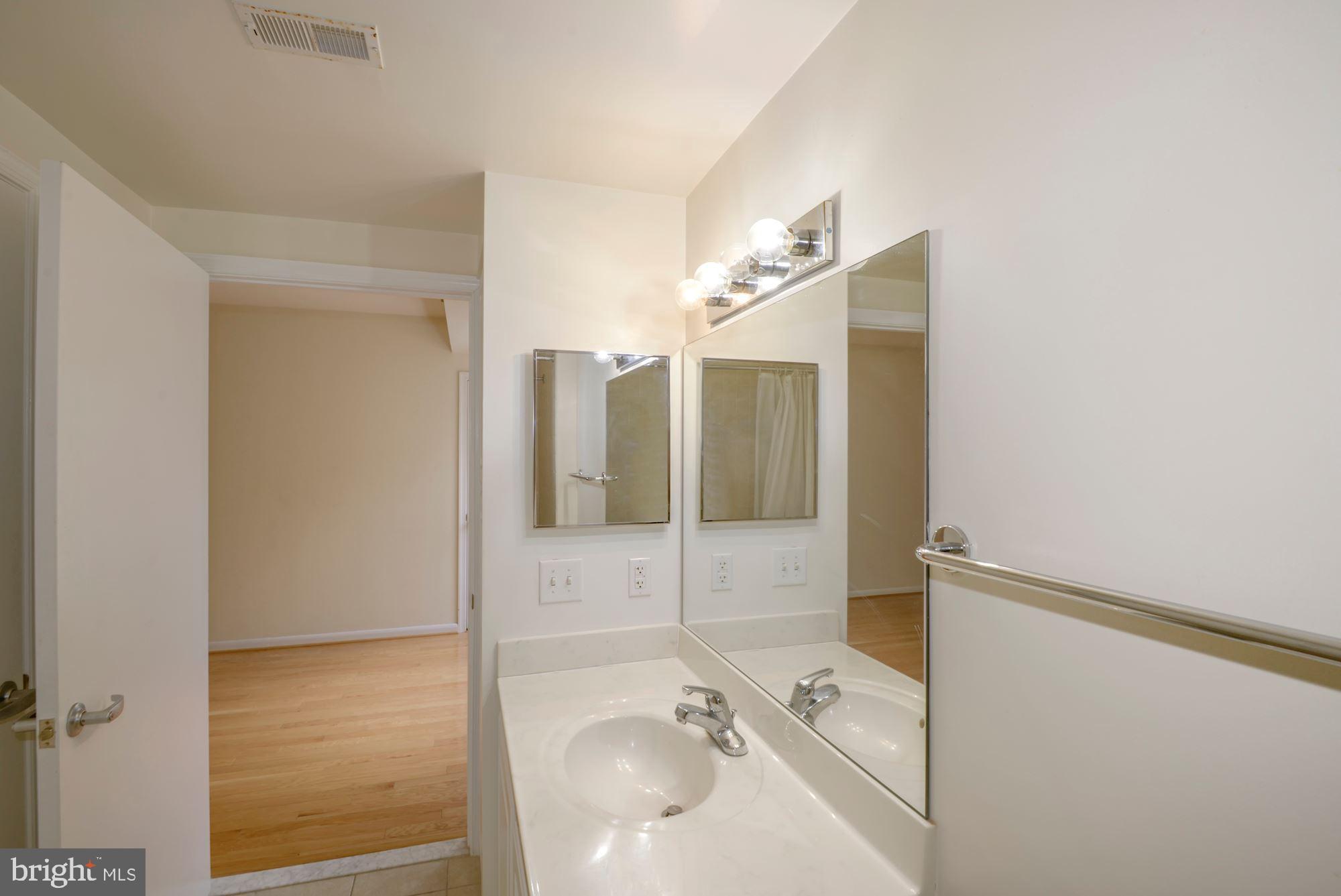 355 I Street Southwest, Unit S607 Washington, DC 20024 - Photo 13 of 27 a bathroom with a bathtub and a shower
