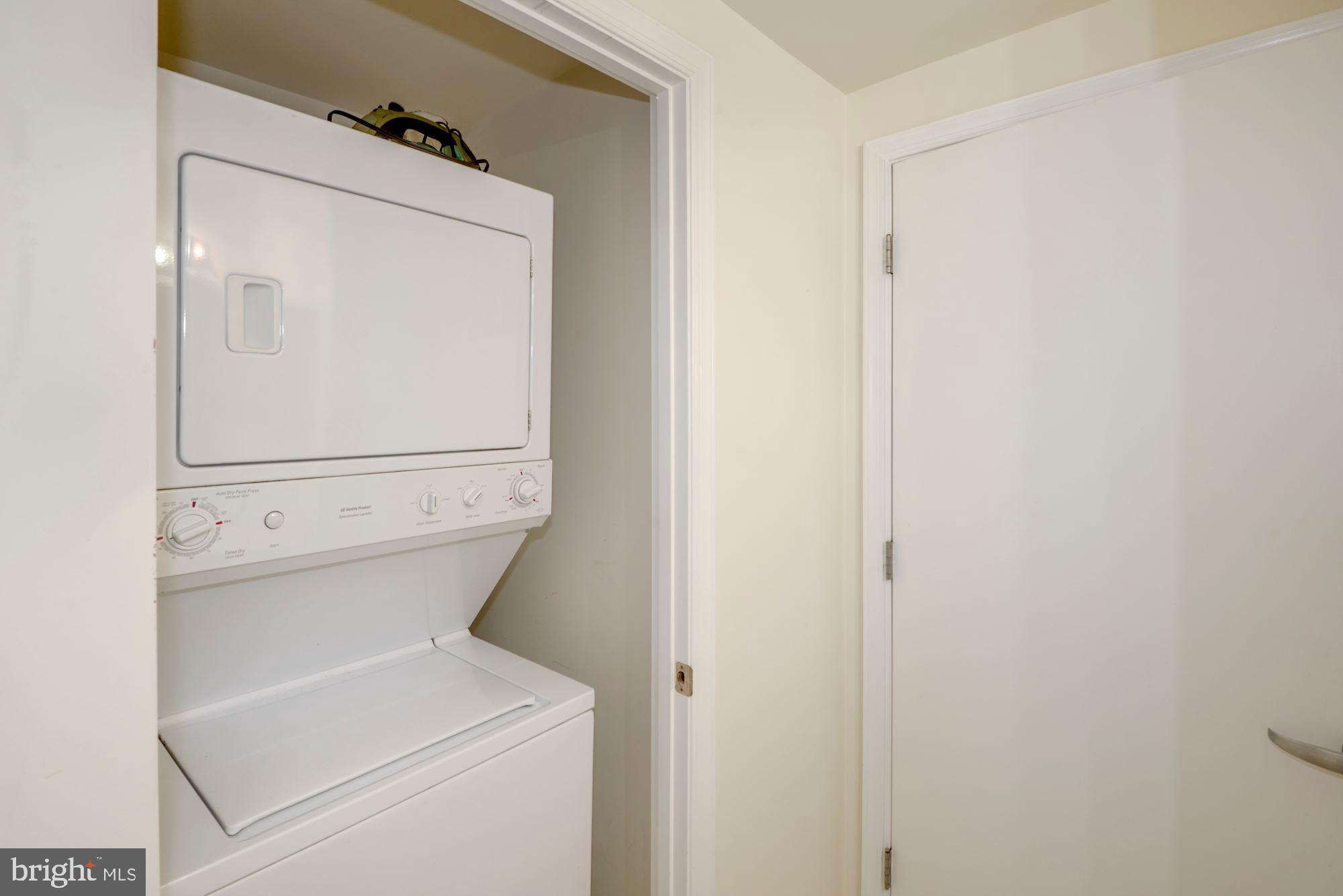 355 I Street Southwest, Unit S607 Washington, DC 20024 - Photo 17 of 27 a utility room with dryer and washer