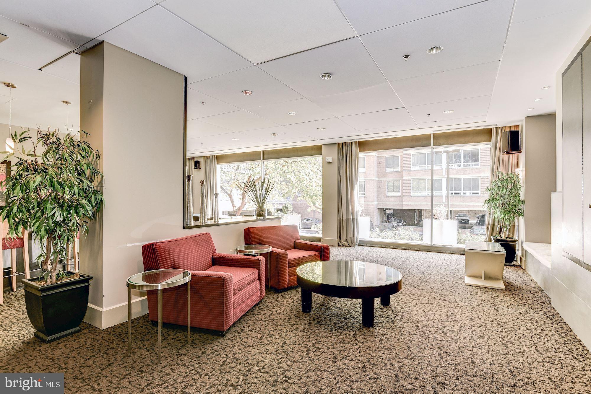 355 I Street Southwest, Unit S607 Washington, DC 20024 - Photo 20 of 27 a living room with furniture and a large window