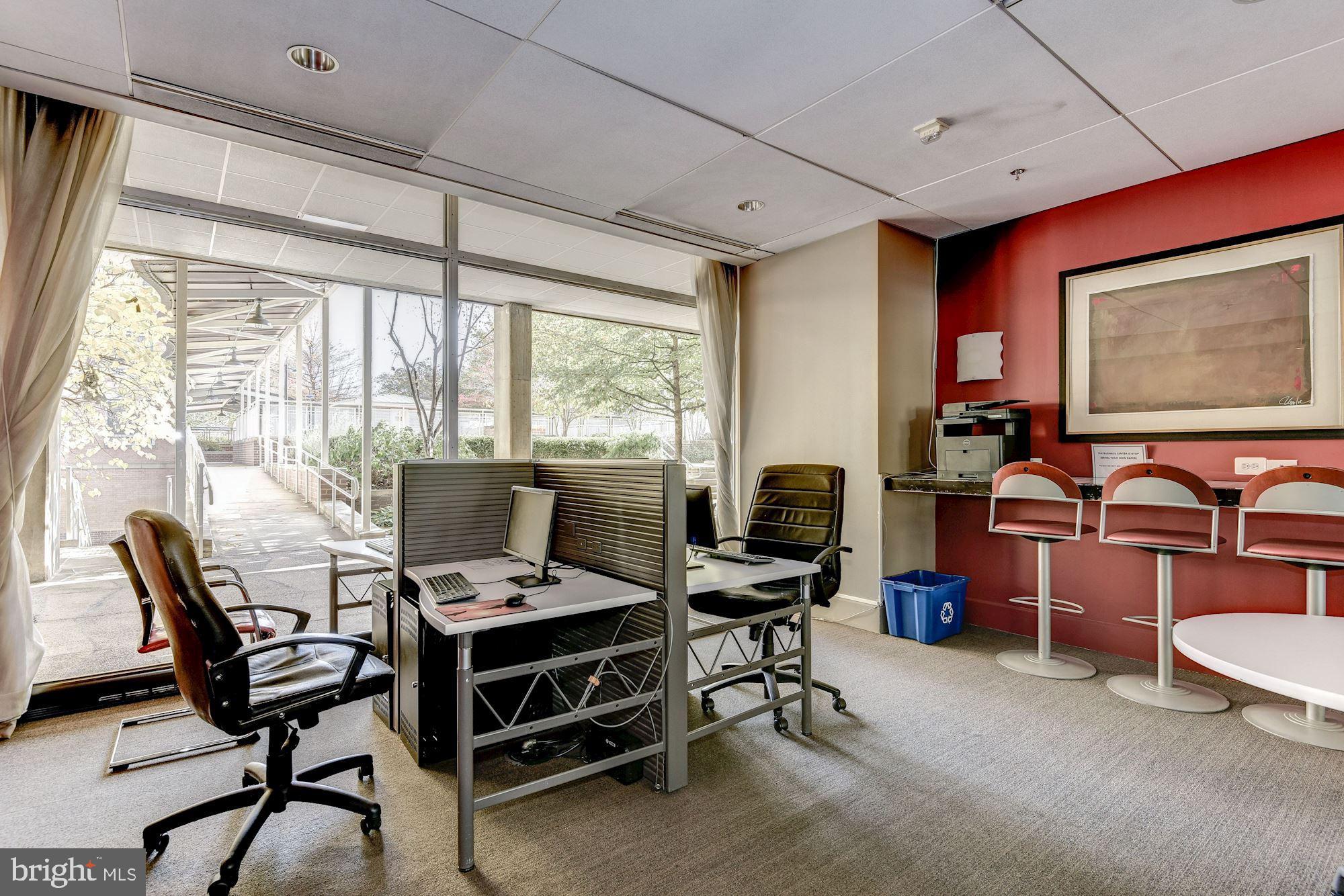 355 I Street Southwest, Unit S607 Washington, DC 20024 - Photo 23 of 27 a view of a workspace with furniture and a window