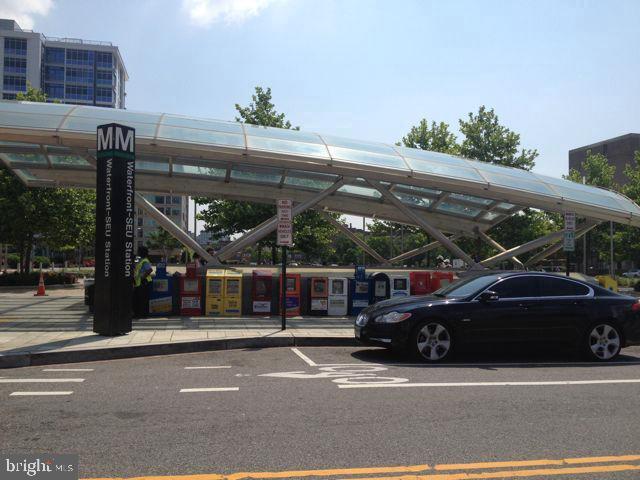 355 I Street Southwest, Unit S607 Washington, DC 20024 - Photo 27 of 27 a view of street with parked cars