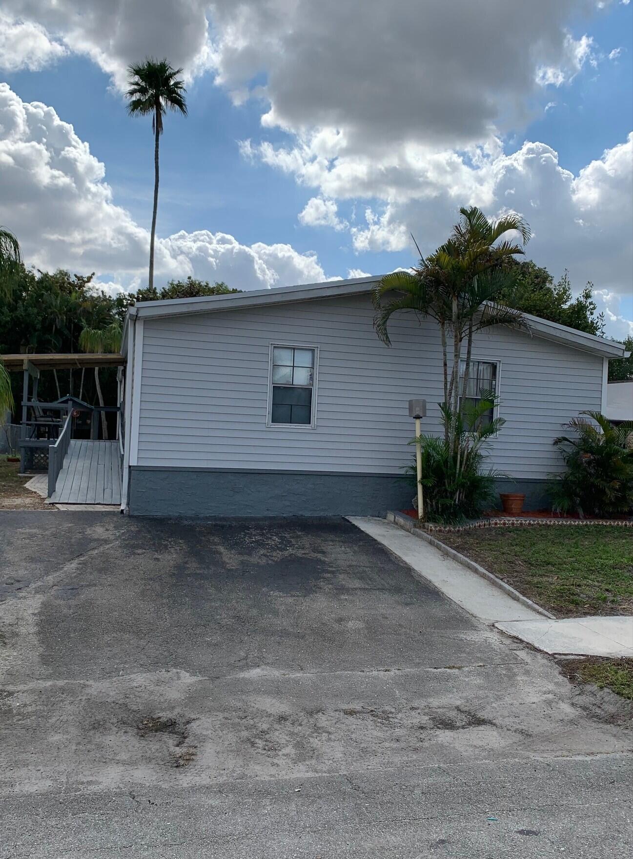 10424 Marina Way Boca Raton, FL 33428 - Photo 2 of 14 Front East