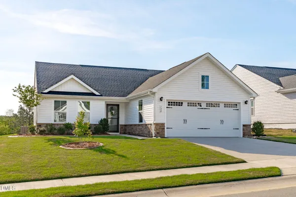a view of house outdoor space and yard