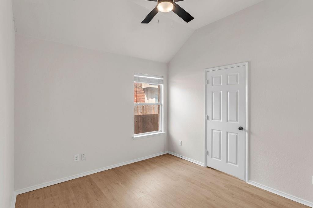 447 Trinity Drive Allen, TX 75002 - Photo 14 of 24 an empty room with windows
