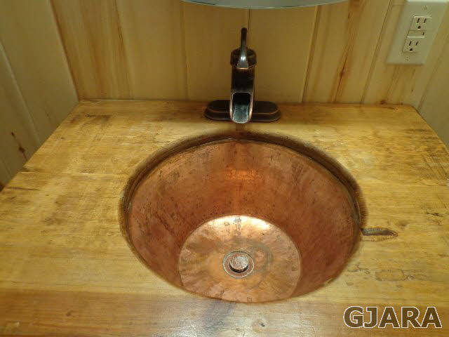 989 17 Road Fruita, CO 81521 - Photo 23 of 23 a bathroom with a granite countertop sink and a mirror