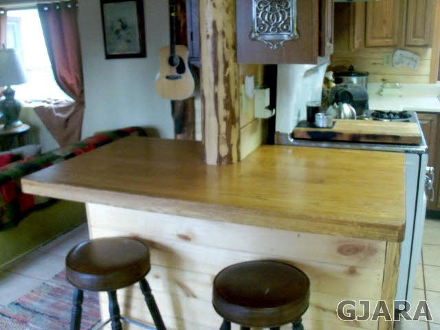 989 17 Road Fruita, CO 81521 - Photo 4 of 23 a kitchen with a table and a chair