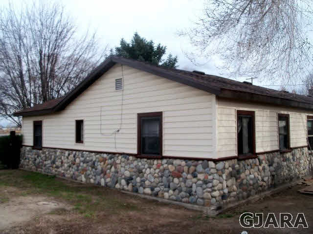 989 17 Road Fruita, CO 81521 - Photo 10 of 23 a house with a yard