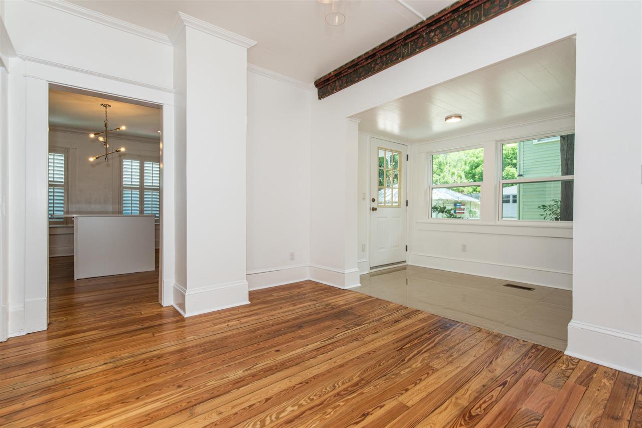 21 Saragossa Street St. Augustine, FL 32084 - Photo 22 of 46 an empty room with wooden floor and windows
