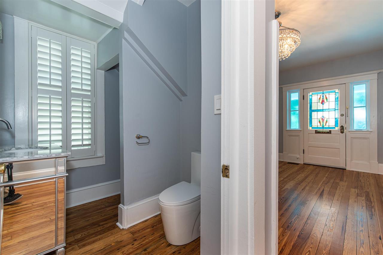 21 Saragossa Street St. Augustine, FL 32084 - Photo 26 of 46 a bathroom with a sink and a mirror