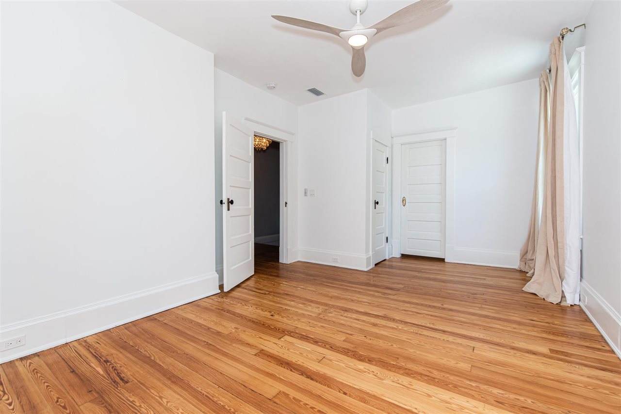 21 Saragossa Street St. Augustine, FL 32084 - Photo 30 of 46 a view of an empty room with wooden floor