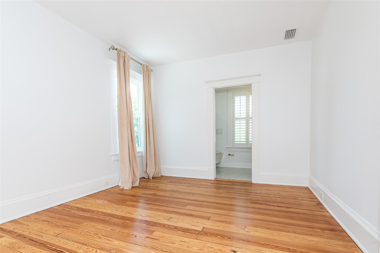 21 Saragossa Street St. Augustine, FL 32084 - Photo 31 of 46 a view of empty room with wooden floor and fan