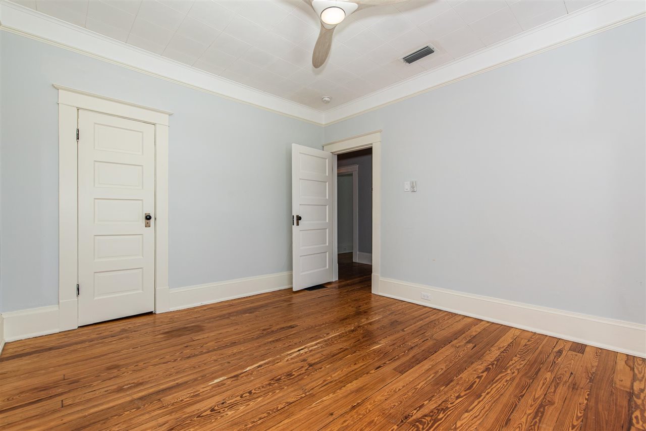 21 Saragossa Street St. Augustine, FL 32084 - Photo 39 of 46 a view of an empty room with wooden floor