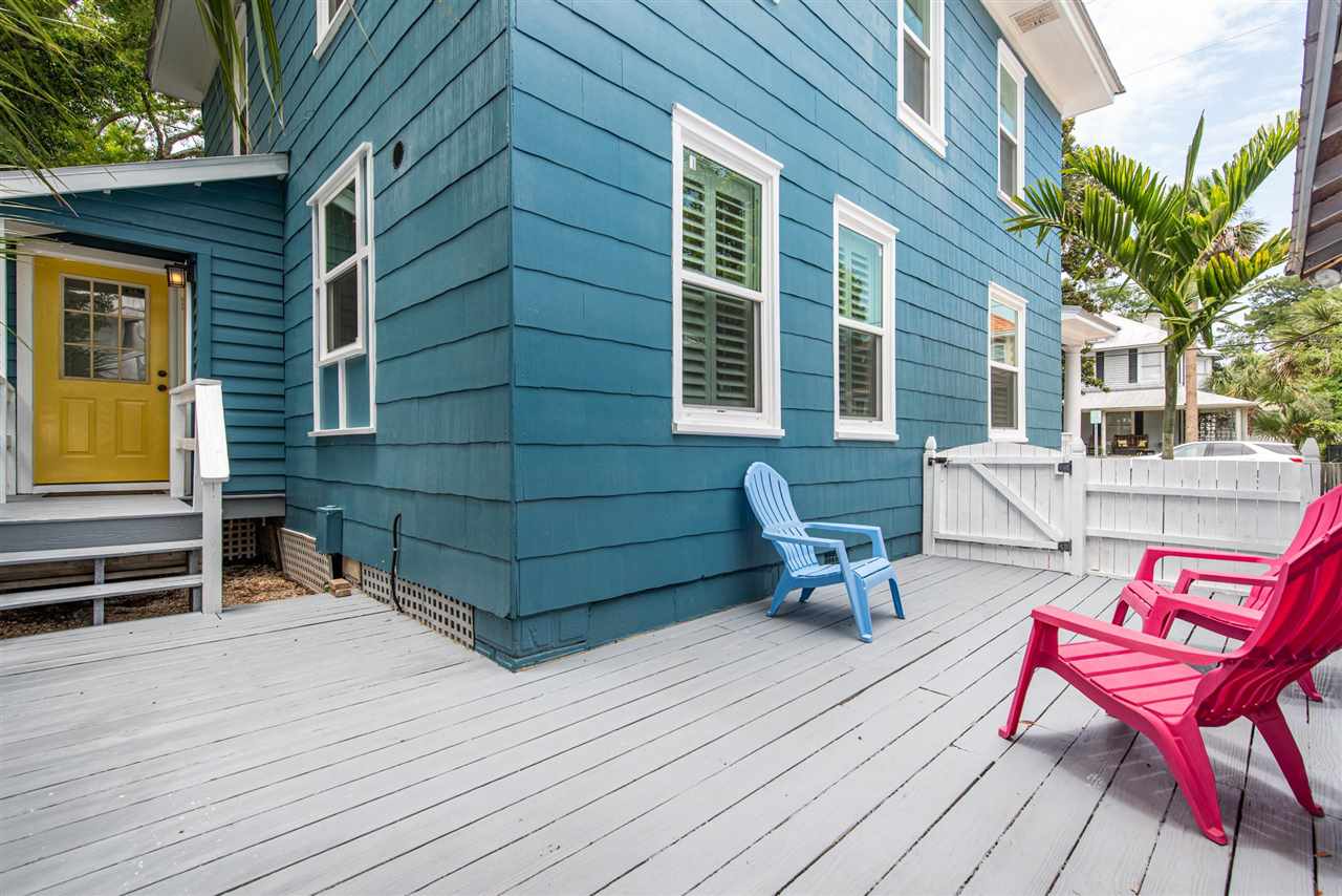 21 Saragossa Street St. Augustine, FL 32084 - Photo 41 of 46 a backyard of a house with seating space