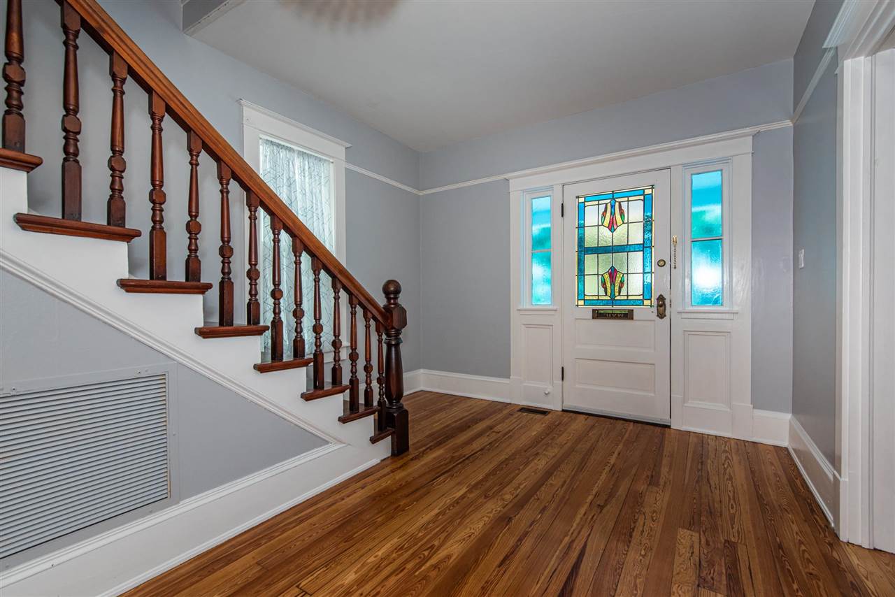 21 Saragossa Street St. Augustine, FL 32084 - Photo 6 of 46 a view of an entryway with wooden floor