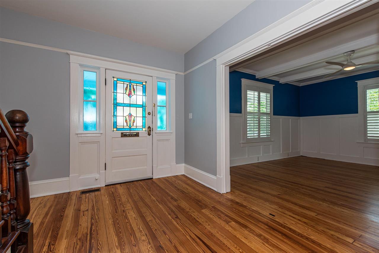 21 Saragossa Street St. Augustine, FL 32084 - Photo 7 of 46 a view of a room with wooden floor and windows