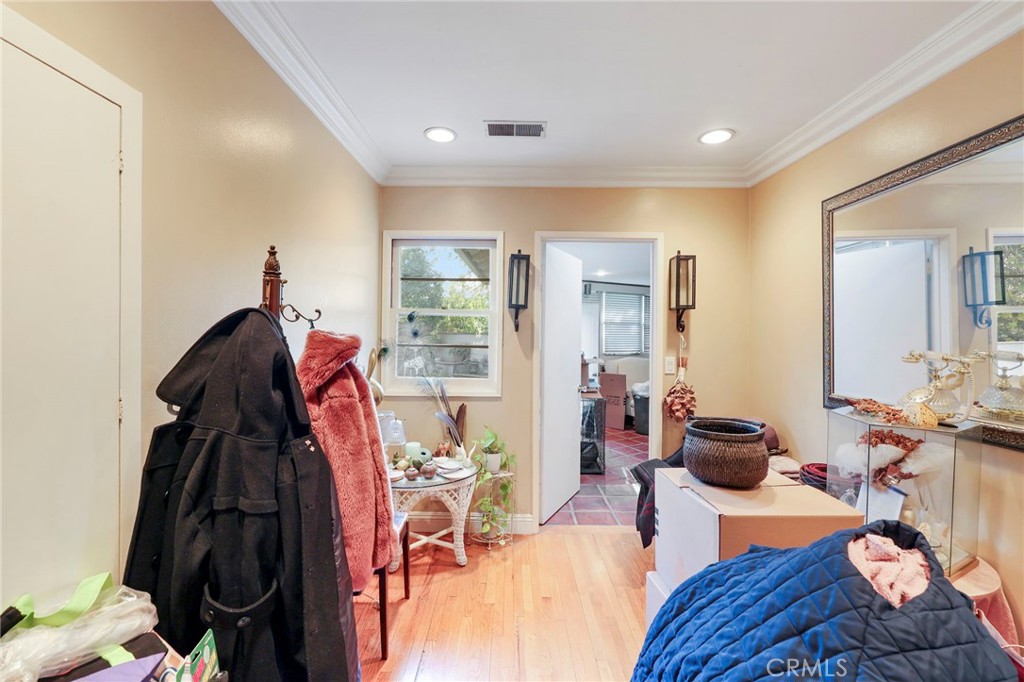 415 Cortez Road Arcadia, CA 91007 - Photo 13 of 27 a living room with furniture and a closet