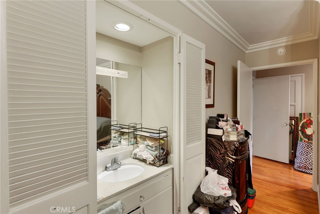 415 Cortez Road Arcadia, CA 91007 - Photo 18 of 27 a bathroom with a sink and mirror