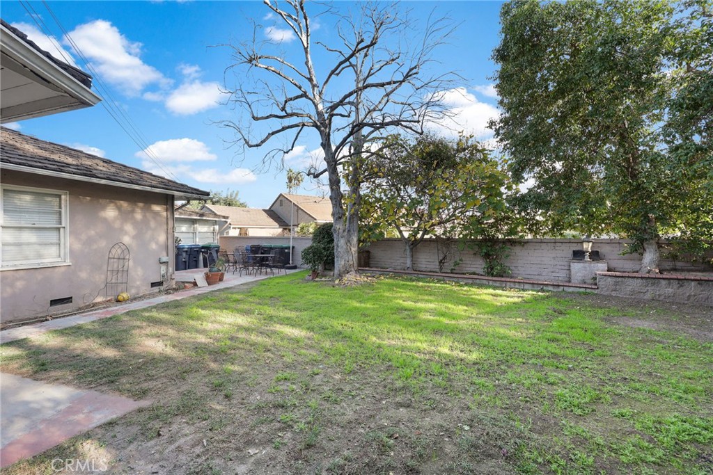 415 Cortez Road Arcadia, CA 91007 - Photo 26 of 27 a backyard of a house with table and chairs