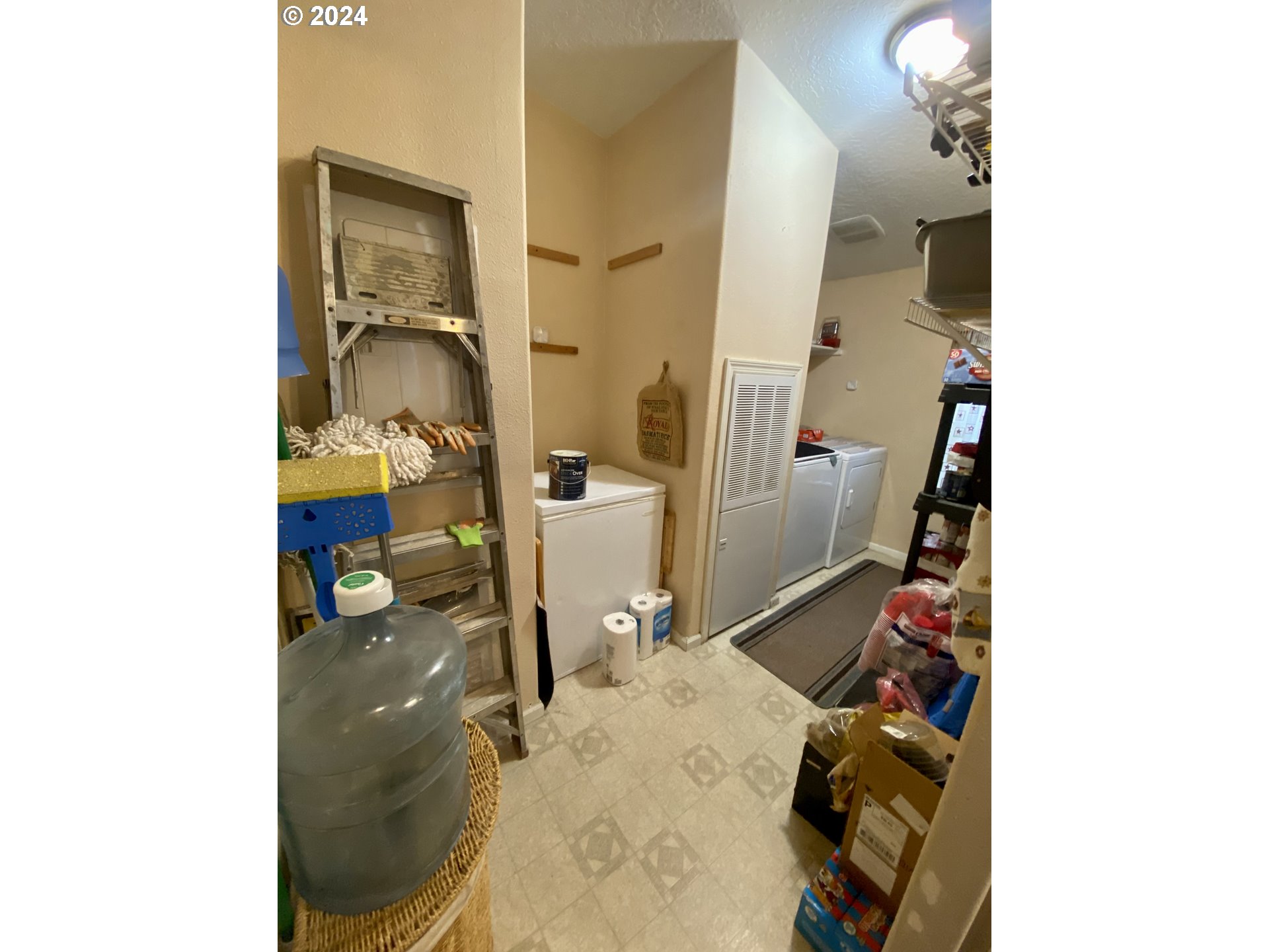 1324 Southwest 33rd Street Pendleton, OR 97801 - Photo 10 of 22 a bedroom with a bed and a cabinets