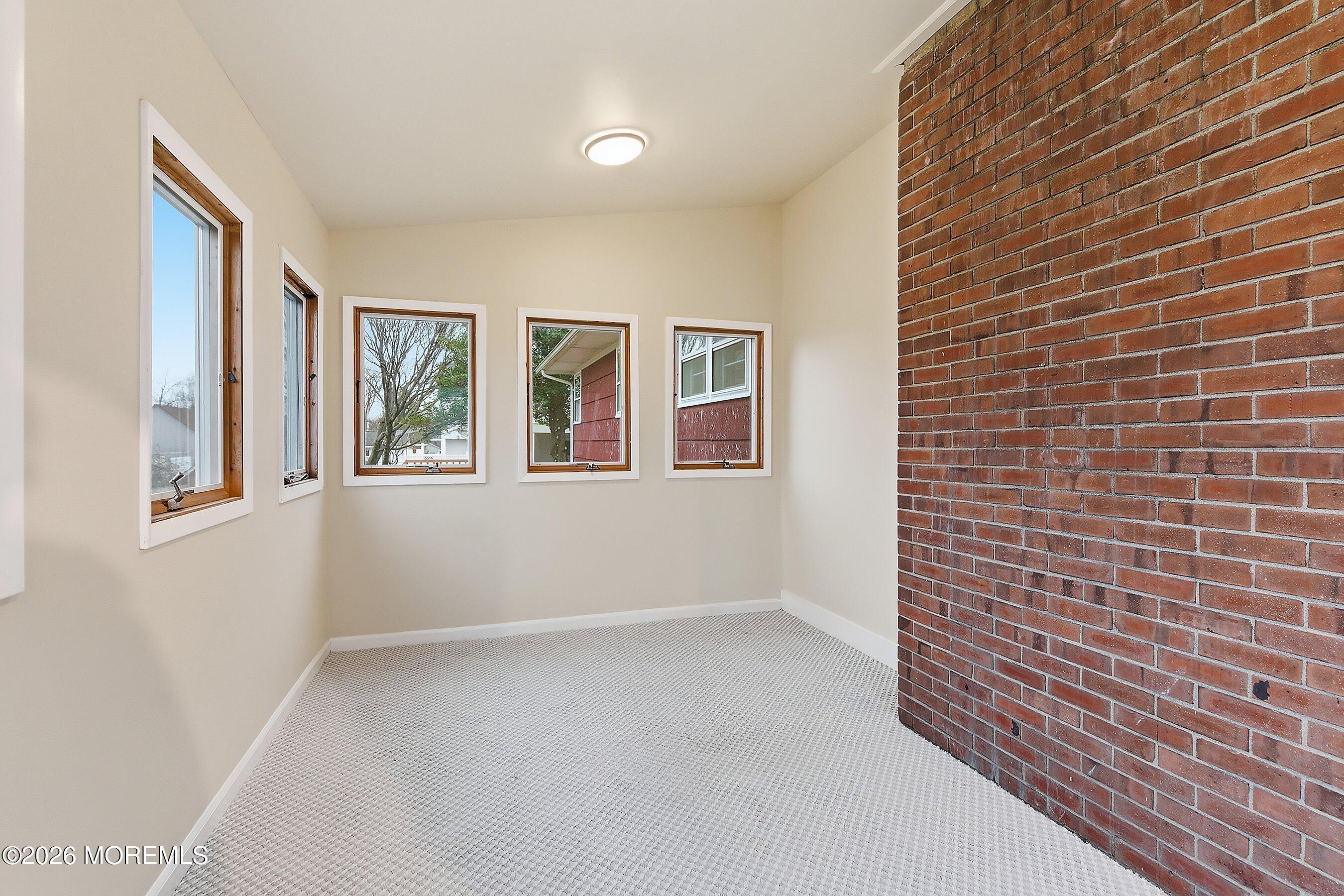 2710 Johnson Street Wall, NJ 07719 - Photo 17 of 38 a view of an empty room with a window