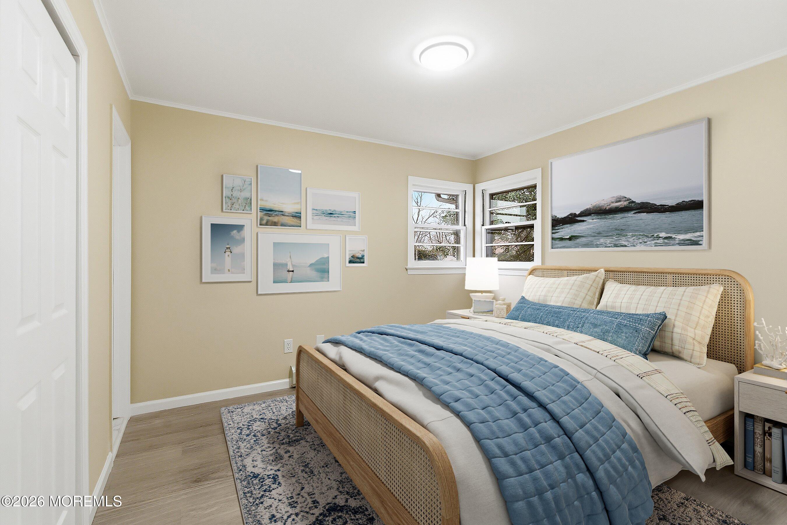 2710 Johnson Street Wall, NJ 07719 - Photo 19 of 38 a bedroom with a large bed and a window