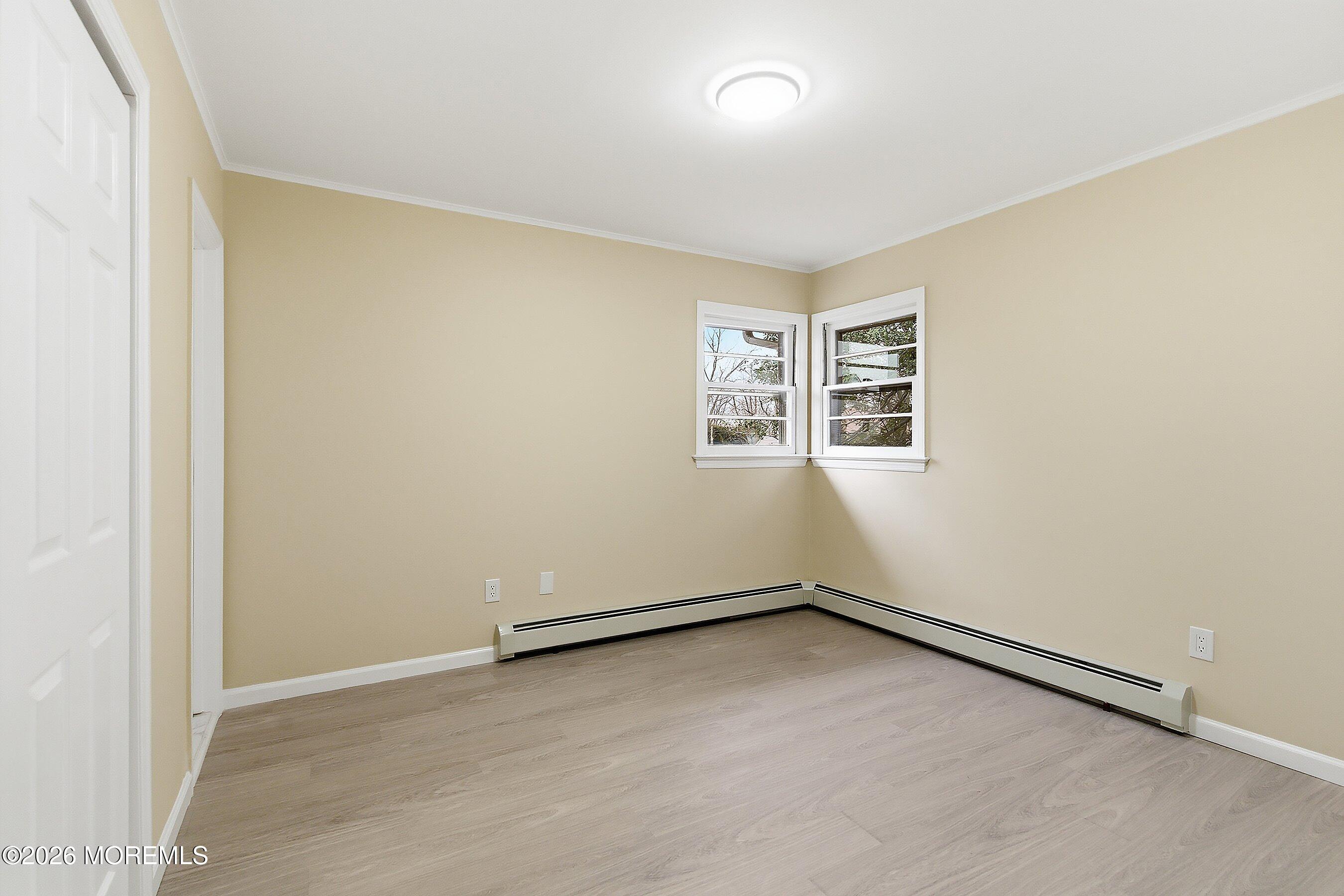 2710 Johnson Street Wall, NJ 07719 - Photo 20 of 38 an empty room with windows