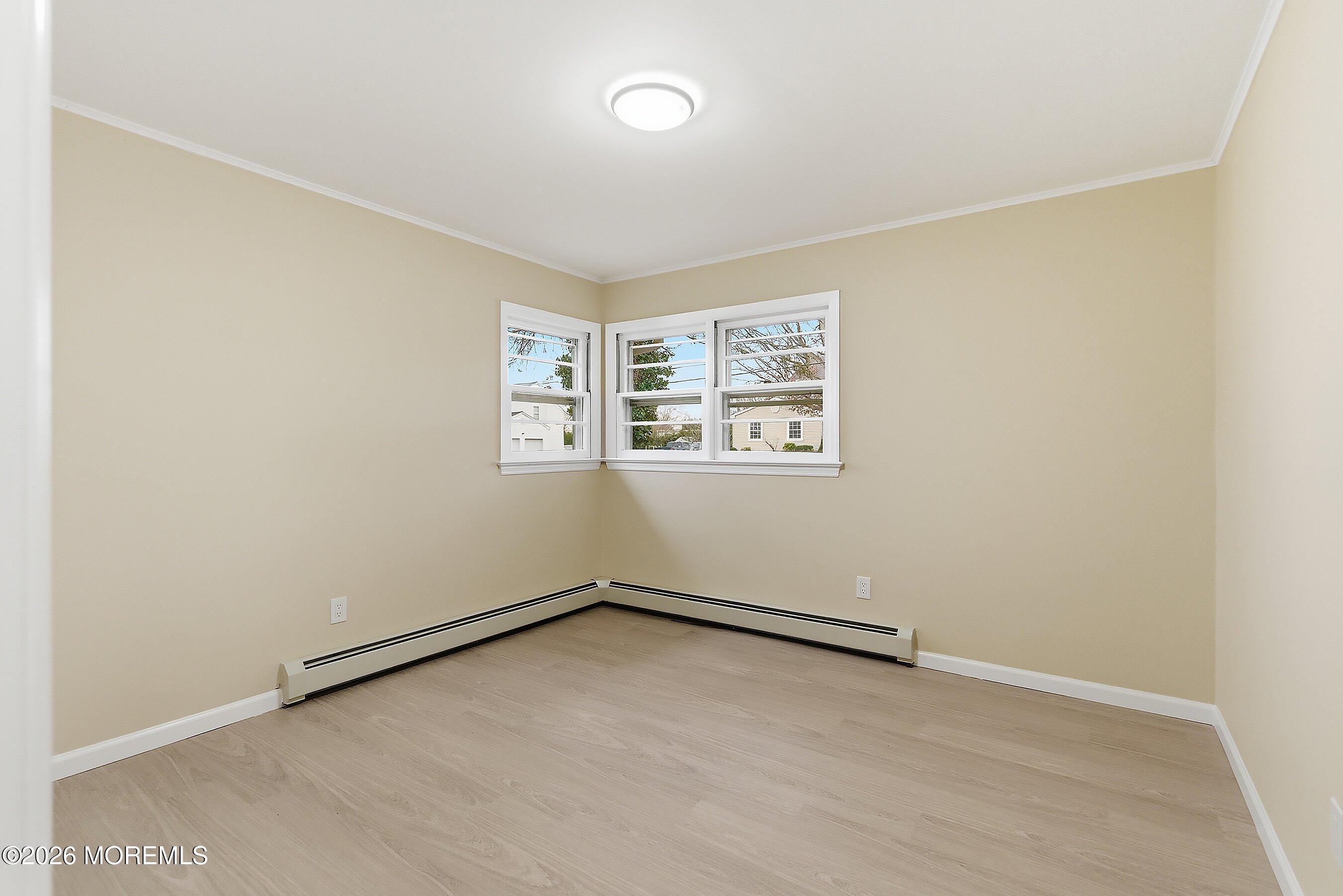 2710 Johnson Street Wall, NJ 07719 - Photo 21 of 38 an empty room with windows