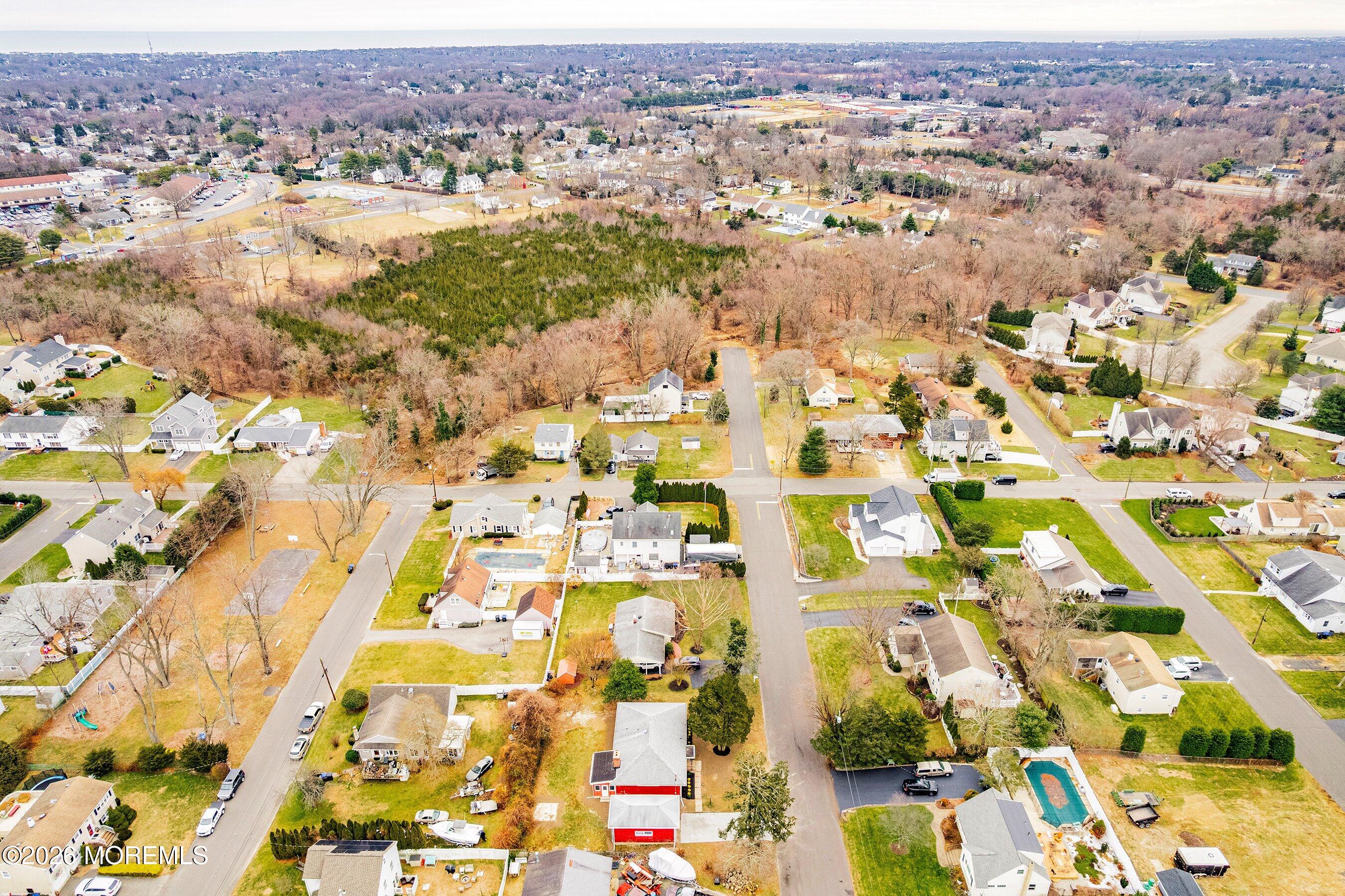 2710 Johnson Street Wall, NJ 07719 - Photo 22 of 38 an aerial view of residential houses with outdoor space