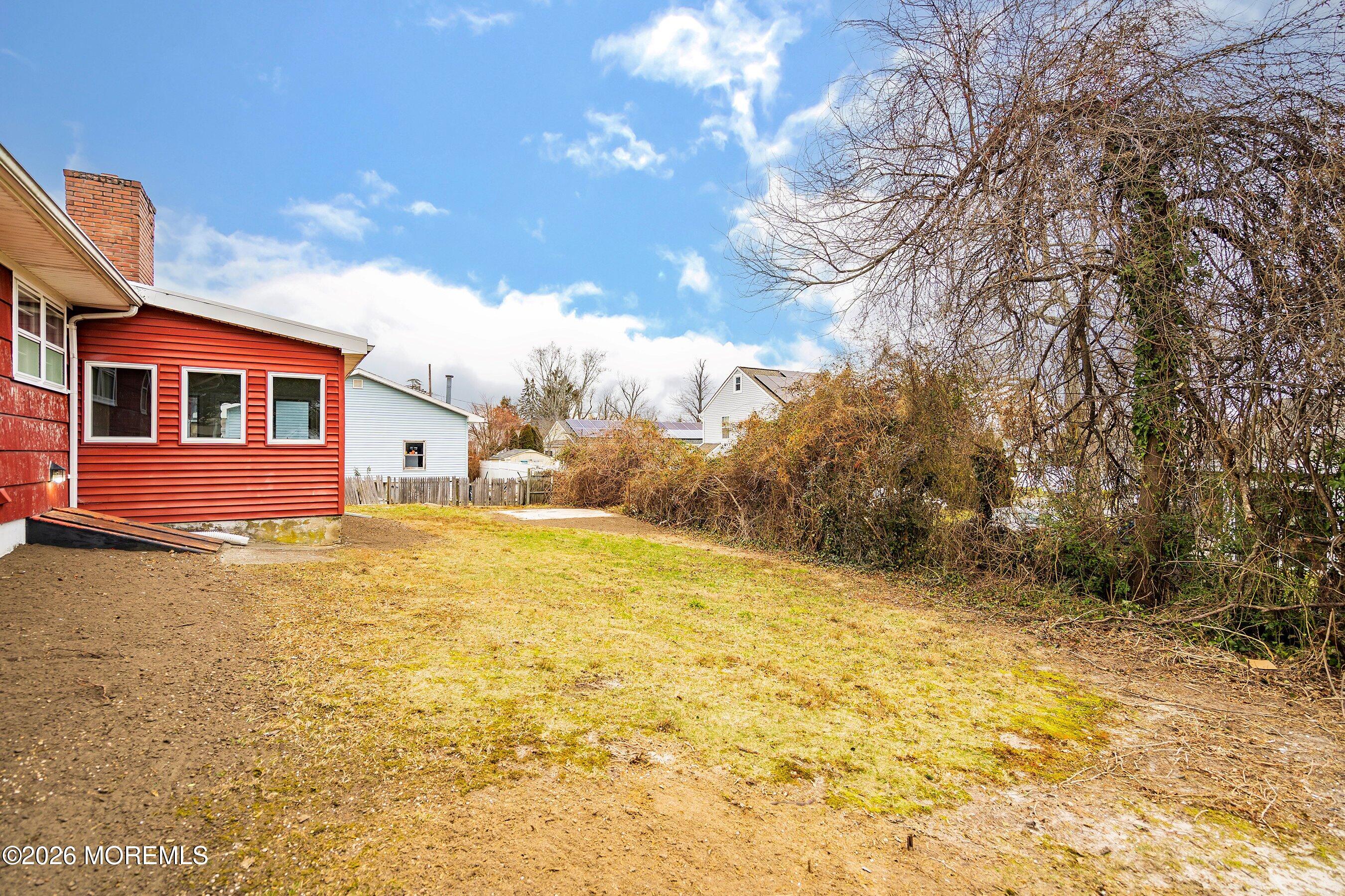 2710 Johnson Street Wall, NJ 07719 - Photo 29 of 38 a view of a yard with a house