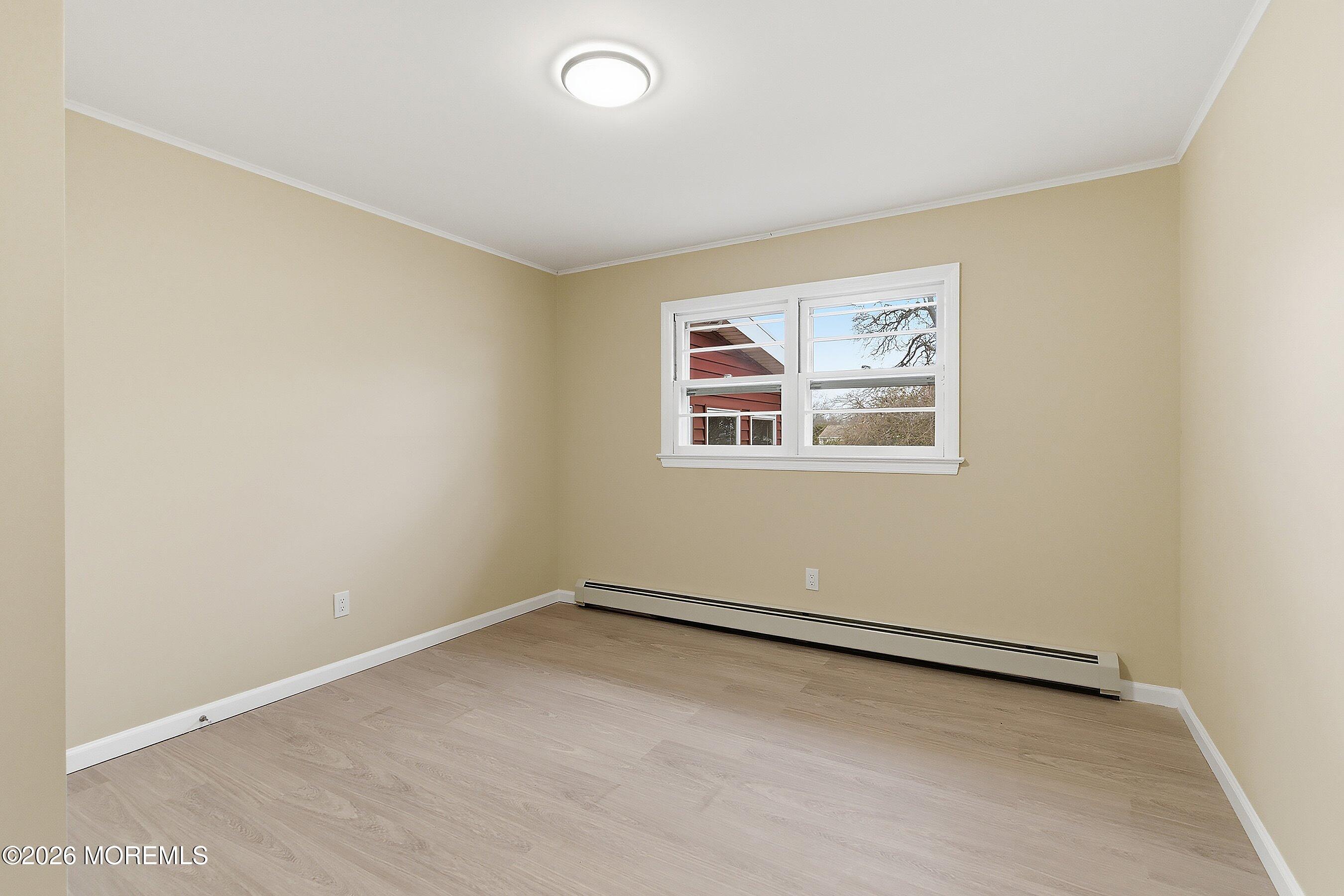 2710 Johnson Street Wall, NJ 07719 - Photo 33 of 38 an empty room with windows