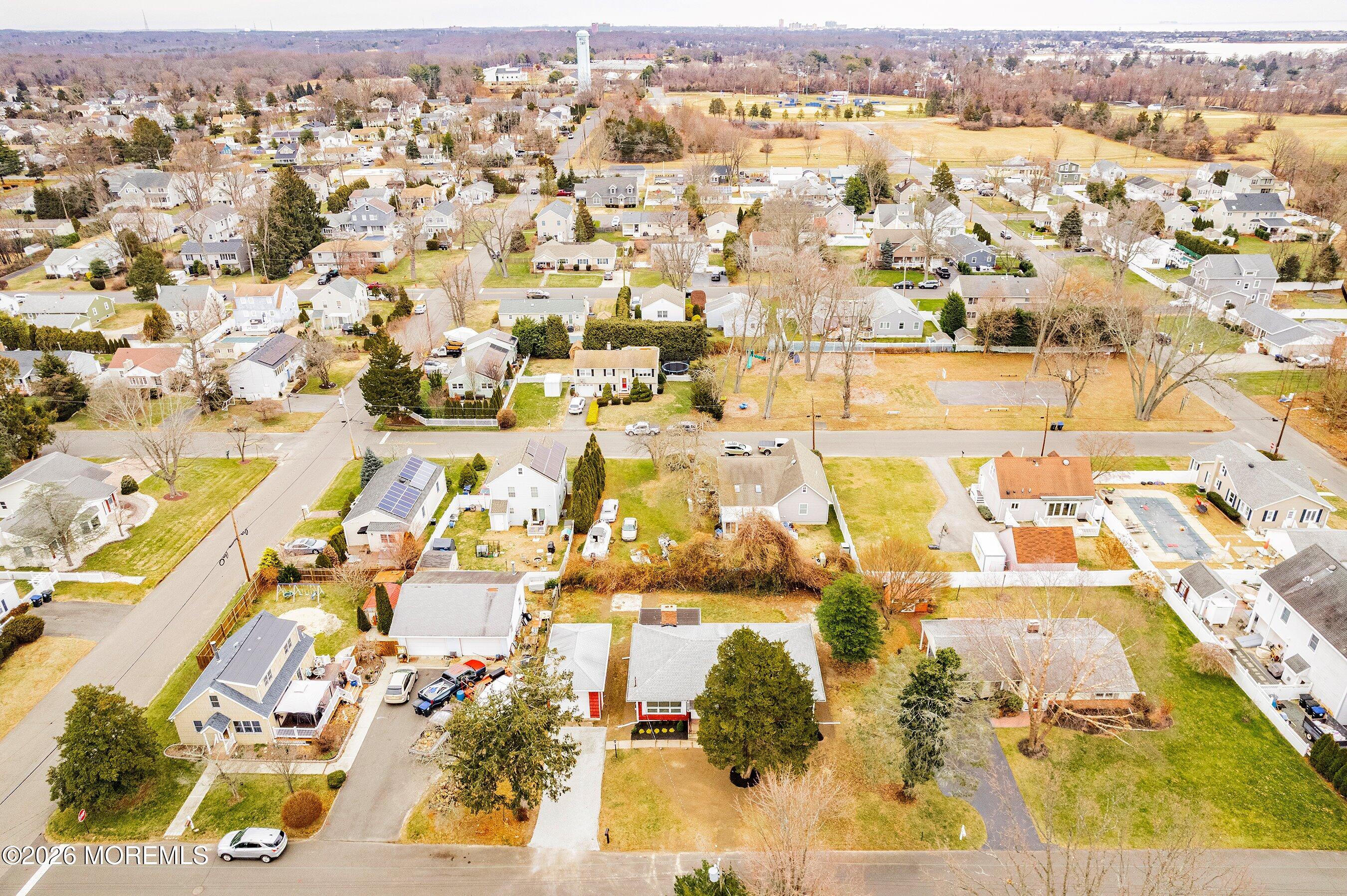 2710 Johnson Street Wall, NJ 07719 - Photo 38 of 38 an aerial view of residential building with parking space