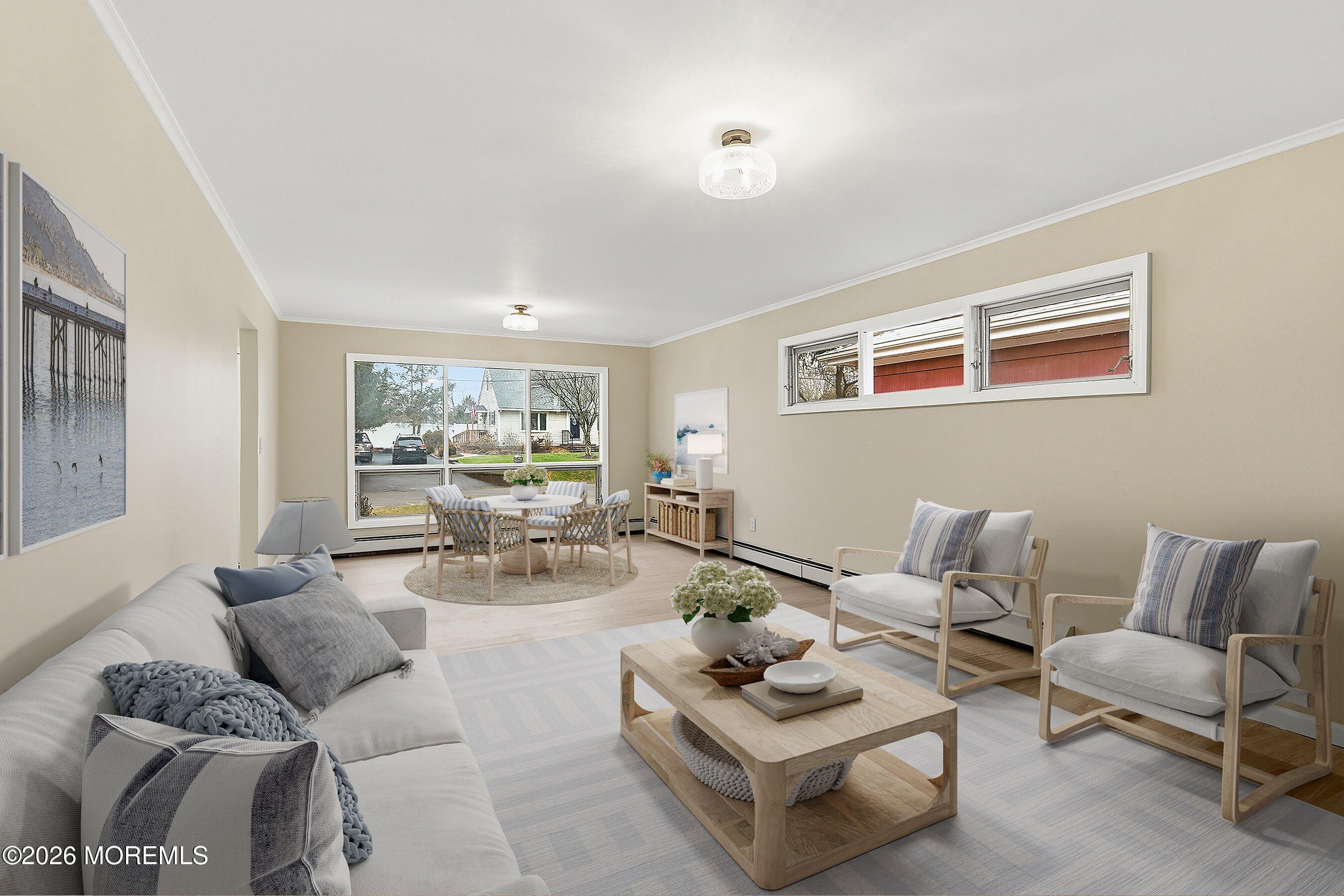 2710 Johnson Street Wall, NJ 07719 - Photo 8 of 38 a living room with furniture and a large window