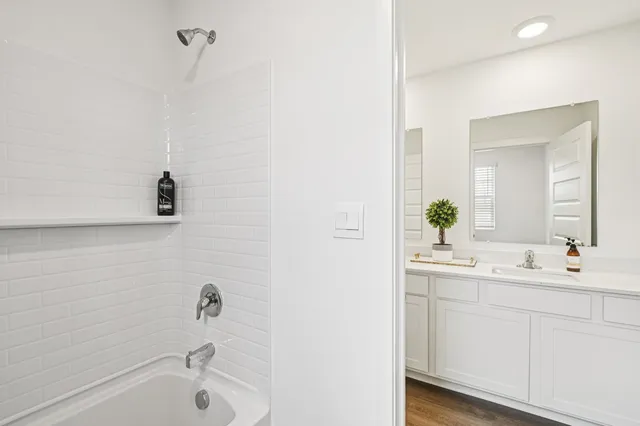a bathroom with a sink and a bathtub