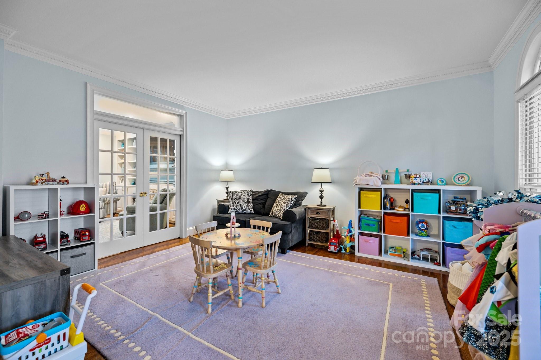 4739 Binfords Ridge Road Charlotte, NC 28226 - Photo 11 of 47 a dining room with lots of furniture and toys