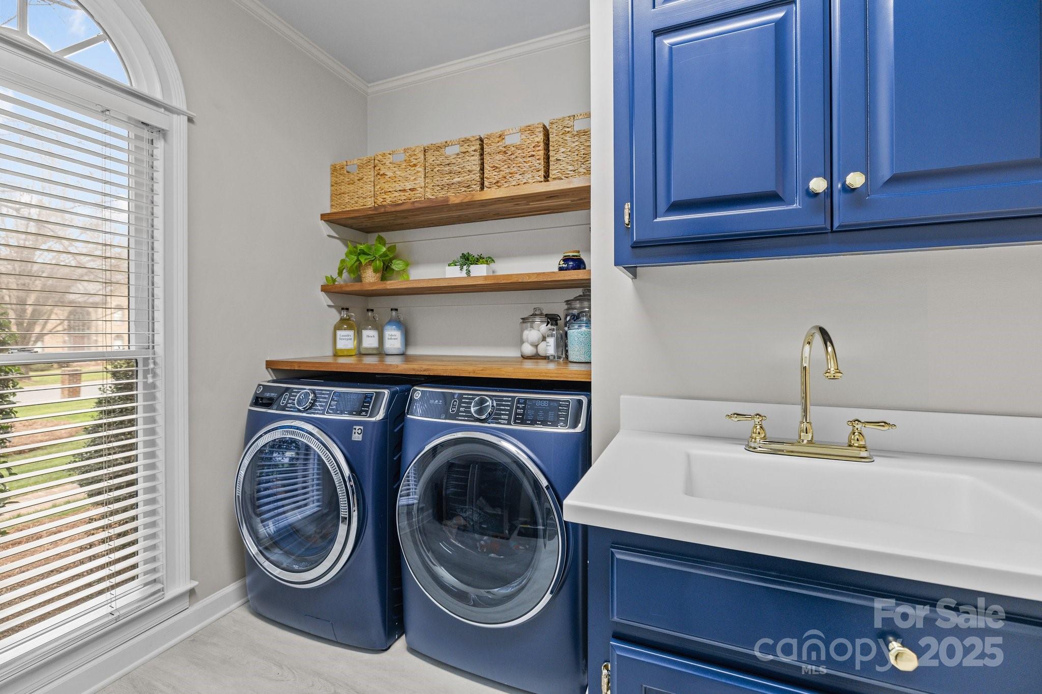 4739 Binfords Ridge Road Charlotte, NC 28226 - Photo 20 of 47 a utility room with sink dryer and washer
