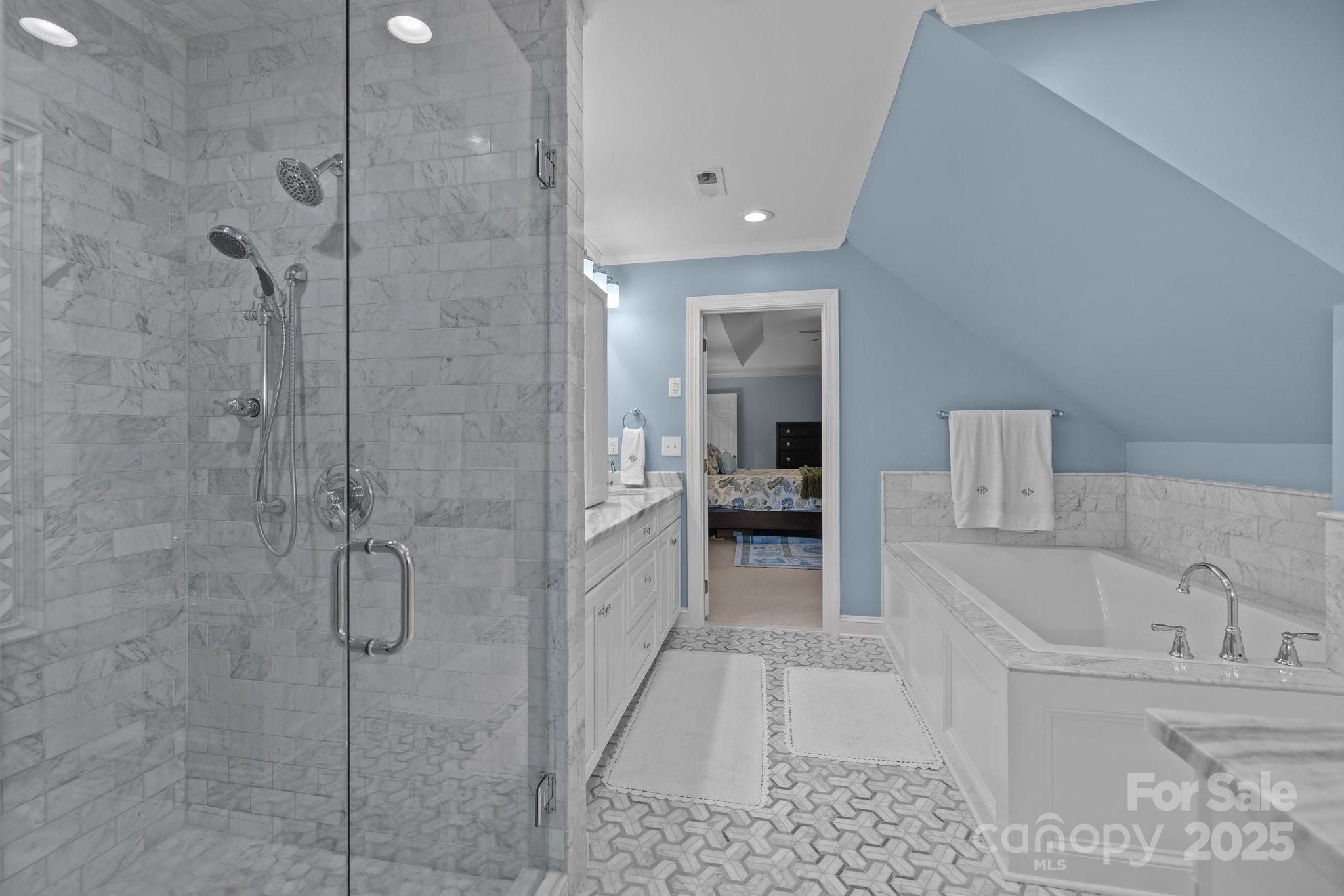 4739 Binfords Ridge Road Charlotte, NC 28226 - Photo 25 of 47 a bathroom with a bathtub and a shower