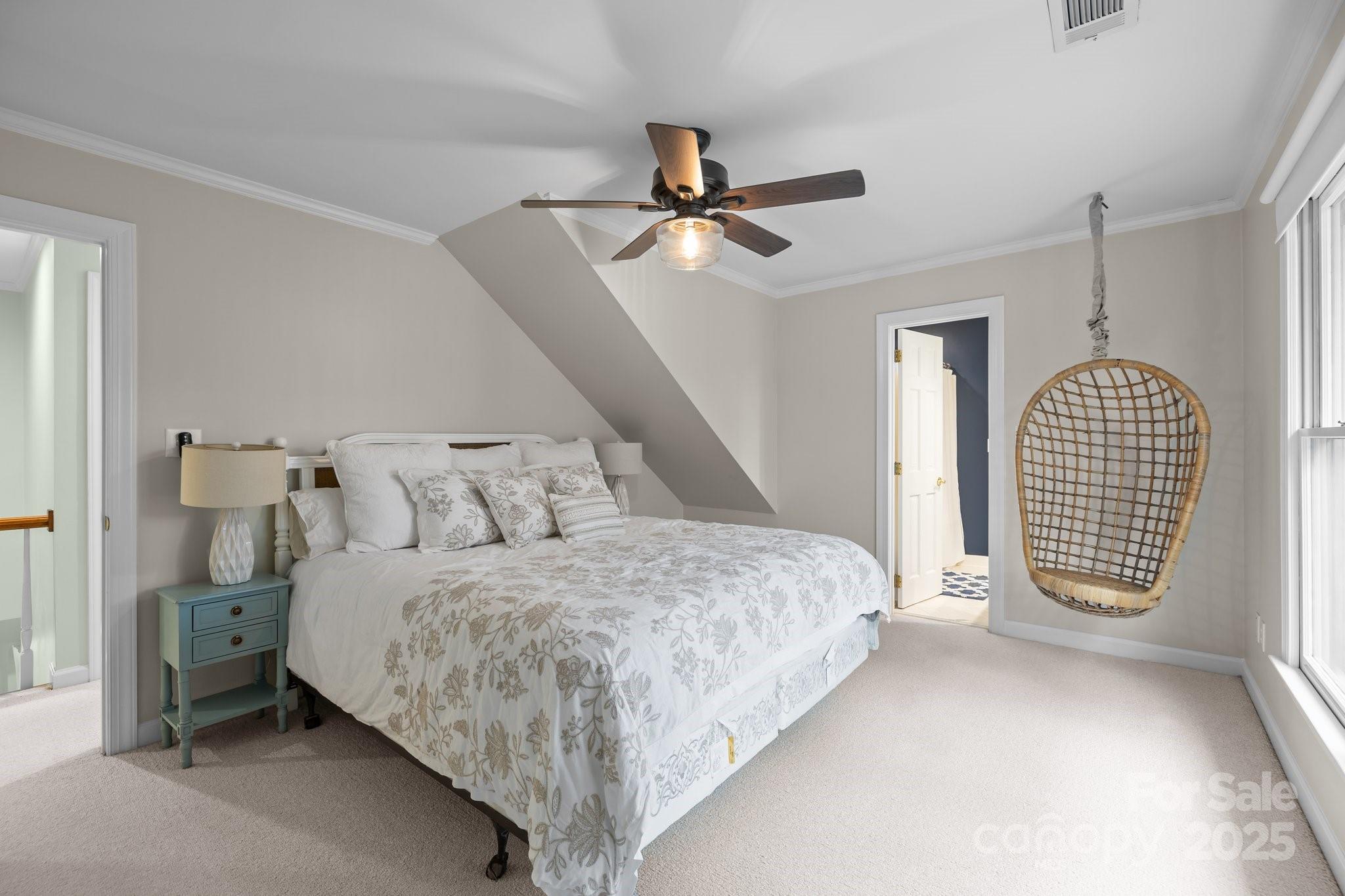 4739 Binfords Ridge Road Charlotte, NC 28226 - Photo 32 of 47 a bedroom with bed and window