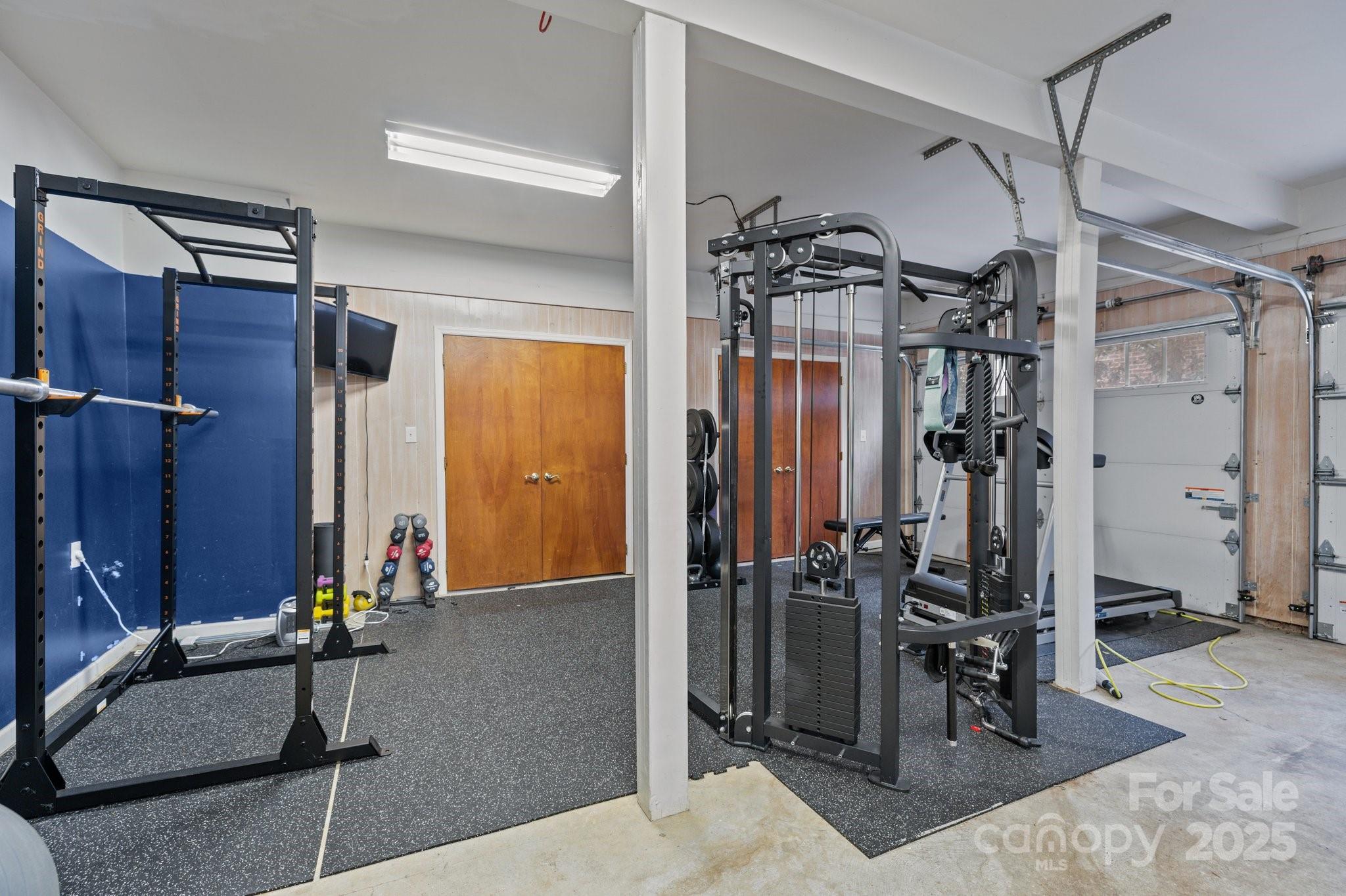 4739 Binfords Ridge Road Charlotte, NC 28226 - Photo 40 of 47 a view of a room with gym equipment