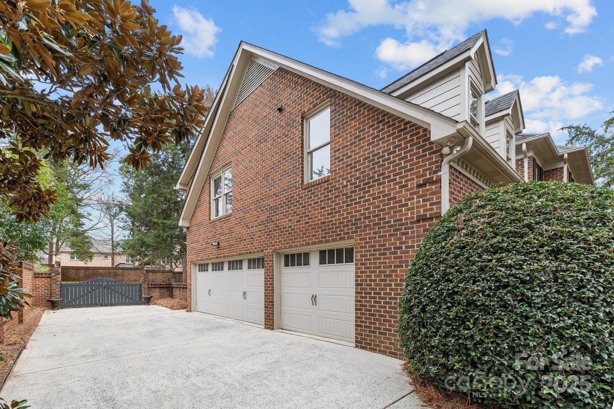 4739 Binfords Ridge Road Charlotte, NC 28226 - Photo 41 of 47 a front view of a house with a garden